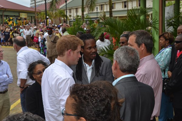 JIS
Prince Harry in Falmouth
His Royal Highness, Prince Henry of Wales (always known as Prince Harry) (at left); and Minister of State in the Ministry of Tourism and Entertainment, Hon. Damion Crawford (2nd left) meet with the management team of the Falmouth Pier, before touring the facility. The Prime arrived in Falmouth today (March 7) for the second leg of his four-day visit to Jamaica to commemorate the Diamond Jubilee of his grandmother, Her Majesty the Queen.
