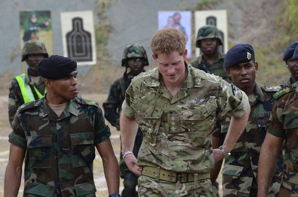 Rudolph Brown/Photographer
Prince Harry visit Up Park Camp Multi-Purpose training facility on Wednesday, March 7-2012