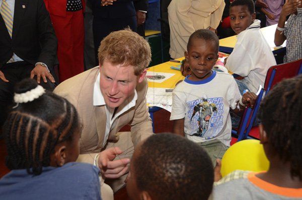 Rudolph Brown/Photographer
Prince Harry chat with children during a visit the Bustamante Hospital for Children on Tuesday, March 6-2012