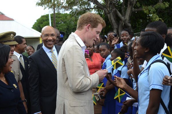 Rudolph Brown/Photographer
Prince Harry and Sir Patrick Allen, (left) Governor general of Jamaica greets students during a visit the Bustamante Hospital for Children on Tuesday, March 6-2012