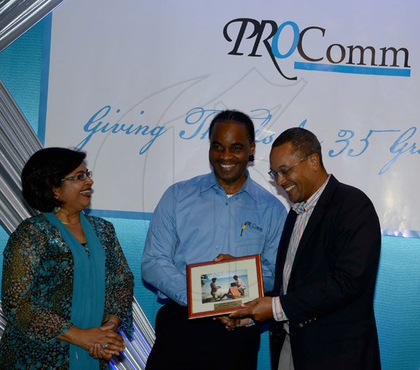 Winston Sill/Freelance Photographer
PRO Com 35th Anniversary Clients and Media Reception, held at the Jamaica Pegasus Hotel, New Kingston on Wednesday night December 4, 2013. Here are Jean Lowrie-Chin (left); -------?????? (centre); and Christopher Barnes (right), Managing Director, Gleaner Company.