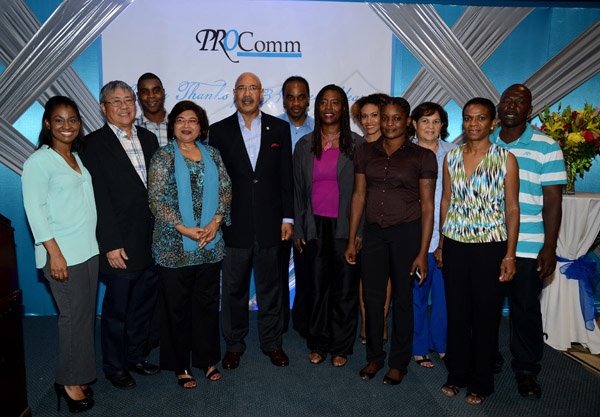 Winston Sill/Freelance Photographer
PRO Com 35th Anniversary Clients and Media Reception, held at the Jamaica Pegasus Hotel, New Kingston on Wednesday night December 4, 2013. Here Governor General Sir Patrick All (centre) pose with the PRO Com Team.