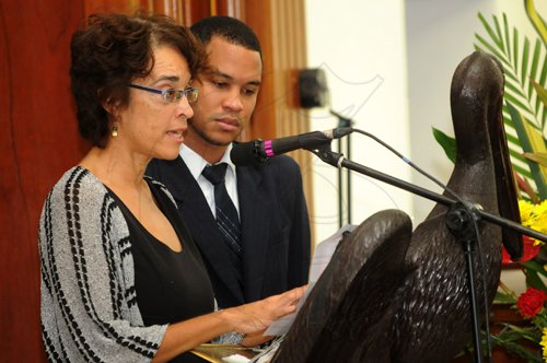 Gladstone Taylor / Photographer

Suzanne Francis-Brown joins Sean Hinds (son) in reading a tribute as seen at the Service of thanksgiving for the life of W. Aggrey Brown held at the UWI Chapel, Kingston