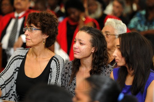 Gladstone Taylor / Photographer

Suzanne Francis-Brown (wife), Kari Brown (daughter) and Robyn Brown (daughter) as seen at the service of thanksgiving for the life of W. Aggrey Brown held at the UWI Chapel, Kingston