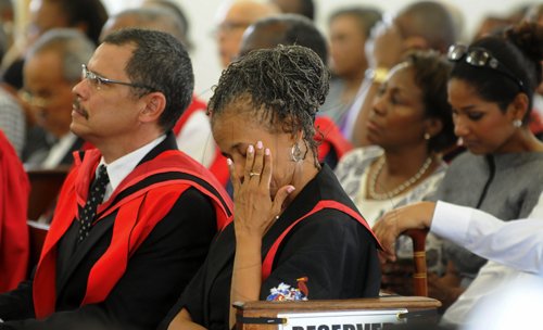 Gladstone Taylor / Photographer

Dr. Camille Bell-Hutchinson (campus registrar) wipes her tears  as she mourns the loss of professor aggrey brown

Service of thanksgiving for the life of W. Aggrey Brown held at the UWI Chapel, Kingston