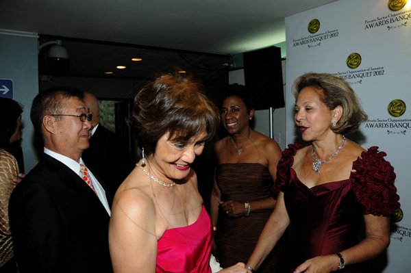 Winston Sill / Freelance Photographer
The Private Sector Organization of Jamaica (PSOJ) 20th  annual Hall of Fame Banquet, held at the Wyndham Kingston Hotel, New Kingston on Wednesday night November 14, 2012. Here are Capt. Michael Lyn (left); Thalia Lyn (centre); Sandra Glasgow (second right); and Lorna Myers (right).