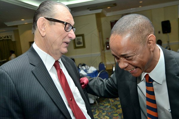 Rudolph Brown/Photographer
Business Desk
R. Danny Williams share a joke with Dennis Chung at the PSOJ Chairman Club Forum breakfast meeting at Knutsford Court Hotel in Kingston on Tuesday, May 28, 2013
