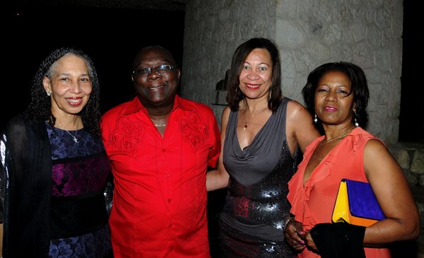 Winston Sill / Freelance Photographer
Pulse International Limited annual Christmas Eve Party, held at Villa Ronai, Old Stony Hill Road on Monday night December 24, 2012. Here are Justice Hillary Phillips (left); Colin Smith (second left); Kay Smith (second right); and Violet Wade (right).