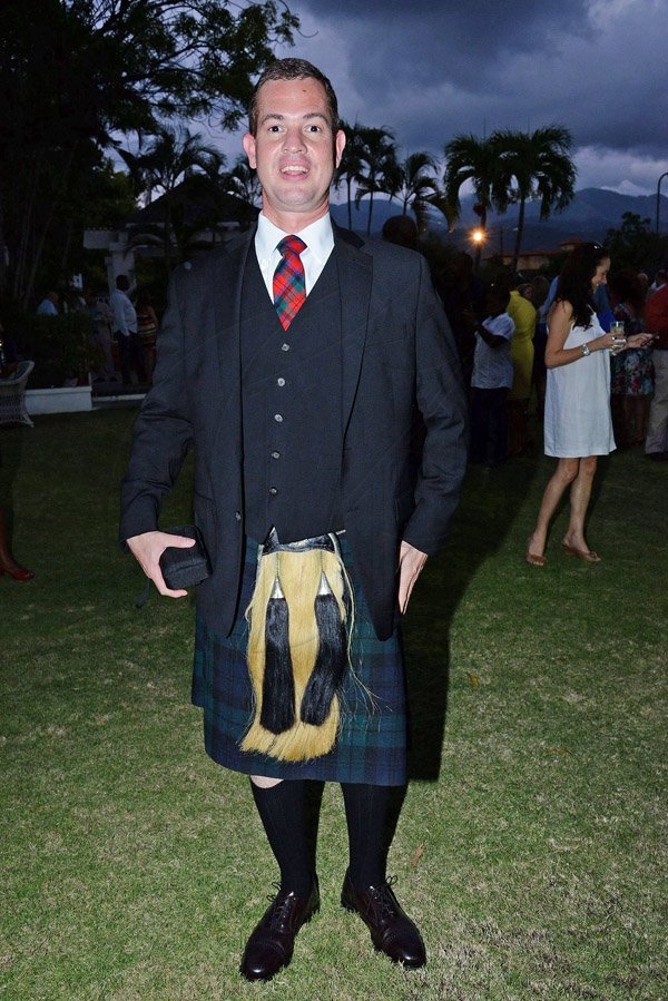 Arthur Bogues shows off his fashionable Scottish kilt for our cameras
Winston Sill/Freelance Photographer
British High Commissioner David Fitton host Welcome Reception for the arrival of the Queen's Baton, held at Trafalgar House, Trafalgar Road on Saturday evening April 5, 2014.
