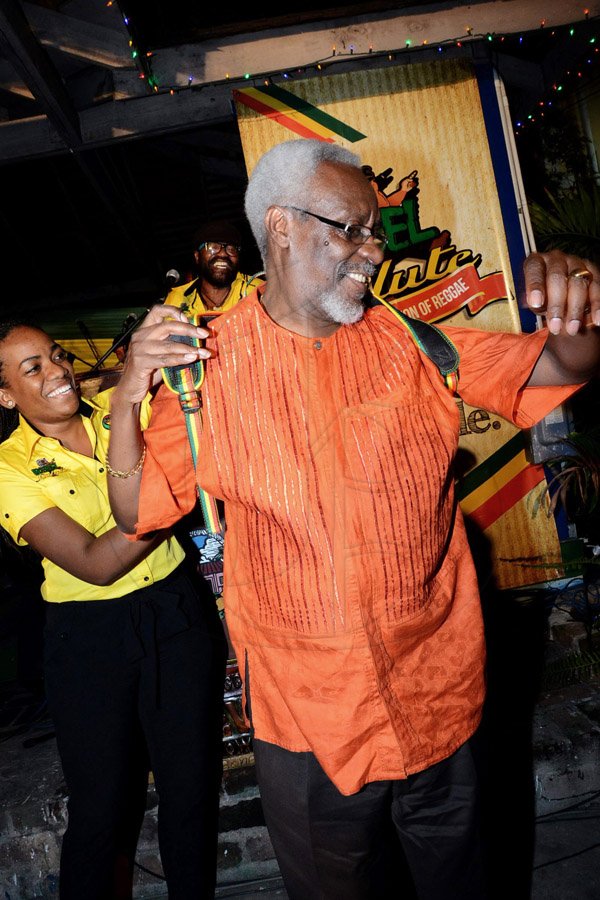 Winston Sill/Freelance Photographer
Rebel Salute 2015 Launch Party, held at Countryside Club, Courtney Walsh Drive on Thursday night December 18, 2014. Here are Maxsalia Salmon (left), Media and Communications Officer, Rebel Salute; and former Prime Minister PJ Patterdon (right).