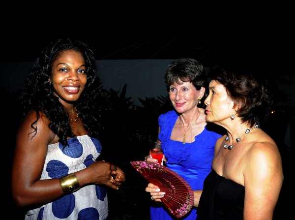 Winston Sill / Freelance Photographer
Robert MacMillan and Thalia Lyn host a reception for Belgiun Ambassador Frederic Meurice and wife Lydie, held at West King's House Road on Saturday night July 21, 2012. Here are Lyide Meorice (left); Jill Drakes (second right); and Thalia Lyn (right).