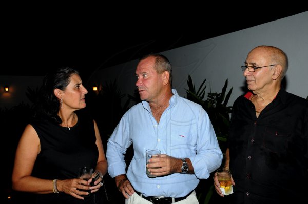 Winston Sill / Freelance Photographer
Robert MacMillan and Thalia Lyn host a reception for Belgiun Ambassador Frederic Meurice and wife Lydie, held at West King's House Road on Saturday night July 21, 2012. Here are Celsa Nuno (left), Spanish Ambassador; Alex Crowther (centre); and Sameer Younis (right).