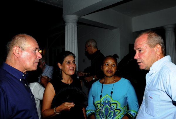 Winston Sill / Freelance Photographer
Robert MacMillan and Thalia Lyn host a reception for Belgiun Ambassador Frederic Meurice and wife Lydie, held at West King's House Road on Saturday night July 21, 2012. Here are Ramon Corvera (left),Deputy Head of Mission, Argentine Embassy; Celsa Nuno (second left), Spanish Ambassador; Mathu Joyini (second right), South Africa High Commissioner; and Alex Crowther (right).