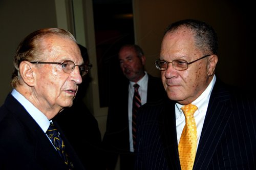 Winston Sill / Freelance Photographer
President of the World Federation of Consuls (WFC), Arnold Foote Jr. host Reception for Prof. Michael Nobel, of the Nobel Prize family, held at the Jamaica Pegasus Hotel, New Kingston on Thursday night January 12, 2012. Here are Hon. Edward Seaga (left); and Foote (right).