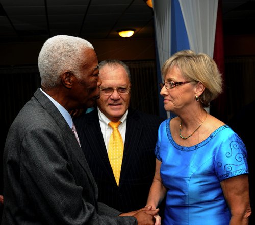 Winston Sill / Freelance Photographer
President of the World Federation of Consuls (WFC), Arnold Foote Jr. host Reception for Prof. Michael Nobel, of the Nobel Prize family, held at the Jamaica Pegasus Hotel, New Kingston on Thursday night January 12, 2012. Here are Minister AJ Nicholson (left); Foote (centre); and Patricia Foote (right).