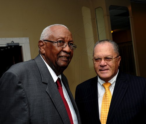 Winston Sill / Freelance Photographer
President of the World Federation of Consuls (WFC), Arnold Foote Jr. host Reception for Prof. Michael Nobel, of the Nobel Prize family, held at the Jamaica Pegasus Hotel, New Kingston on Thursday night January 12, 2012. Here are Ted Warmington (left); and Foote (right).