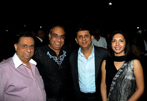 Winston Sill / Freelance Photographer
Businessman Lachu Ramchandani (second left) and brother Loku (left) share camera time with Bharat Thakurani (second right) and Dr Sonali Thakurani.


The High Commissioner of India Mohinder Grover and wife Vardeep Grover host reception on the occasion of the 63rd Republic Day of India, held at India House, East Kings House Road on Thursday January 26, 2012.