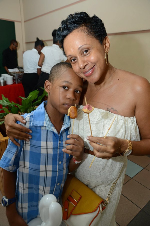 Rudolph Brown/Photographer
Cassie McKenzie with her son Jelaun at the Reggae Jammin special viewing of the movie Disney Planes hosting they valued Customers Children at Palace Cineplex, Sovereign on Saturday, August 17, 2013