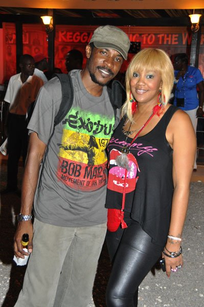 Janet Silvera/Gleaner Writer
Sumfest - From L- Female DJ Tifa and her agent Jerome Hamilton of Headline Entertainment pose for the camera outside the Jamaica Tourist Board booth at Reggae Sumfest 2K11 at Catherine Hall in Montego Bay last Friday night.