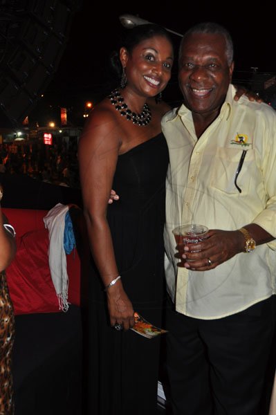 Janet Silvera Photo
 
Godfrey and Odette Dyer in an embracing mood at the Summerfest Productions booth last Friday at Reggae Sumfest 2011 at Catherine Hall in Montego Bay.