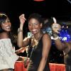 From L- Dimari Samuels, Abbygay Dallas and Diandra Young enjoying every moment of I-Octane at the Digicel booth at Reggae Sumfest 2K11 at Catherine Hall in Montego Bay last Friday night