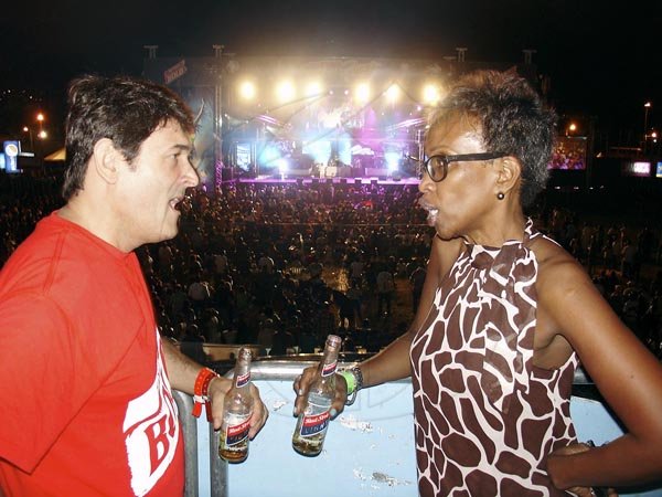 Red Stripe Managing Director Renato Gonzalez chats with Katherine Phipps inside the Red Stripe Swag Deck during International Night 1, Friday July 22 at Reggae Sumfest in Montego Bay.