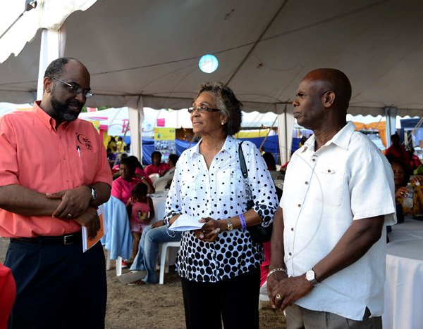 Winston Sill/Freelance Photographer
The annual Jamaica Cancer Society Relay For Life, held at Police Officers Club, Hope Road on Saturday June 14, 2014. Here are Earl Jarrett (left), chairman, Jamaica Cancer Society; Lady Rheima Hall (centre); and Custos Steadman Fuller (right).