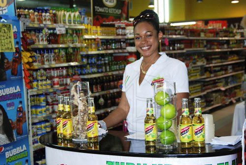 Mark Titus



Chynel Legister, shows off her products at the Red Strip Light stand during HiLo Super Sunday in celebration of Restaurant Week in Montego Bay yesterday.
