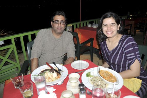 Sheena Gayle/Gleaner Writer
 Jimmy and his wife Tina Sharoff from Voila Boutique excite their tastebuds  at House Boat Grill in Montego Bay on Sunday evening.

**********************************************************************during Restaurant Week
