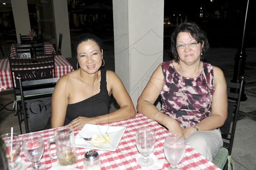 Sheena Gayle/Gleaner Writer
Angela?s Italian Restaurant served up some delicious meals on Sunday during The Gleaner?s Restaurant Week and sisters Dr Paulette Hossmann of Tai Flora (left) and Marcia Cai-Chun enjoyed every moment it.