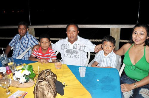 Sheena Gayle/Gleaner Writer
 Dining by Pier One on the Waterfront was a must-do activity during Restaurant Week for the Yen family. From left: Andre, Jason, dad Peter;  three-year old Alex and mother Cheryl Yen, all spent some family time over dinner on Sunday.
