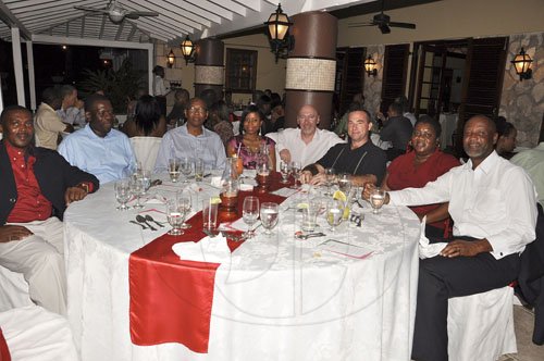 Janet Silvera Photo
 Close to 40 members of the business community turned out for Restaurant Week dinner with Digicel bigwigs at the Sugar Mill in Montego Bay on Monday night. From Left are: Trevor Edwards, Roland Clarke, Earnest Grant, Olivia Tate, Seamus Loughlin, Jaap Van Dam, Orlene McNeish and Averton Brown.