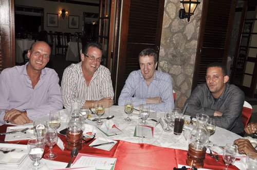 Janet Silvera Photo
 
Secrets Resorts' Emilio Huhn and Deryck Meany, share lens time with Digicel CEO, Mark Linehan and Jamaica Tours' Noel Sloley Jr. during Restaurant Week dinner at Sugar Mill in Montego Bay Monday night.
