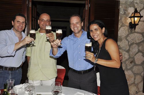 Janet Silvera
Cheers to The Gleaner's Restaurant Week, say from left: Digicel's Jason Corrigan, RIU's Frank Sondern, and Iberostar's Philipp Hofer and wife Fernanda during a Digicel sponsored dinner at the Sugar Mill in Montego Bay Monday night.