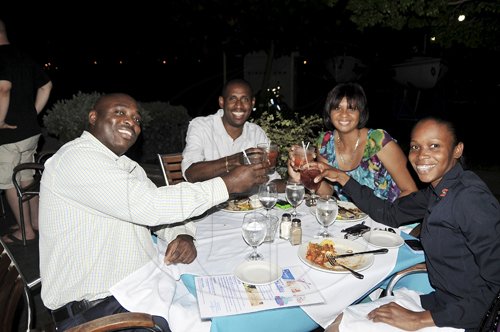 Sheena Gayle/Gleaner Writer
Restaurant Week
Friends Garfield Williams, Garth Moodie, Nicole Fennell and Kayan Lee-Mckenzie enjoyed the ambiance and food during Restaurant Week at Seahorse Grill in Montego Bay on Monday.
