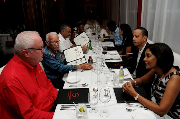 Winston Sill / Freelance Photographer
Restaurant feature; Nordia Craig and guests dine at Rojo, Span ish Court Hotel, New Kingston on Tuesday night November 8, 2011. Here from left are Robert Mason; Prof. Gerald Lalor; Mark Lalor; Nordia Craig; Lance Craig; Kimberly Mullings; Gary Barrow; and Bernadette Barrow.