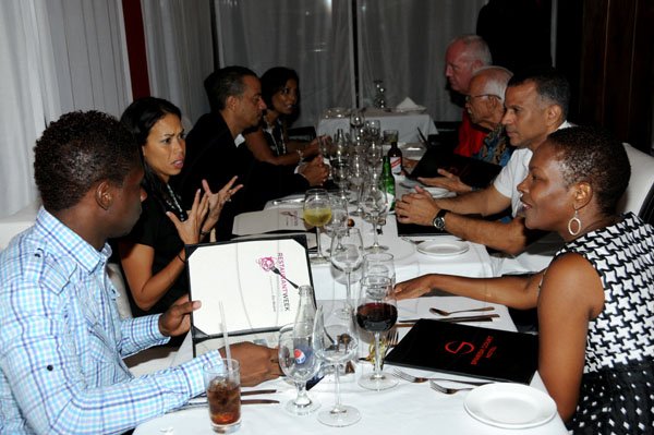 Winston Sill / Freelance Photographer
Restaurant feature; Nordia Craig and guests dine at Rojo, Span ish Court Hotel, New Kingston on Tuesday night November 8, 2011. Here from left are Lance Craig; Kimberly Mullings; Gary Barrow; Burnadette Barrow; Robert Mason; Prof. Gerald Lalor; Mark Lalor; and Nordia Craig.