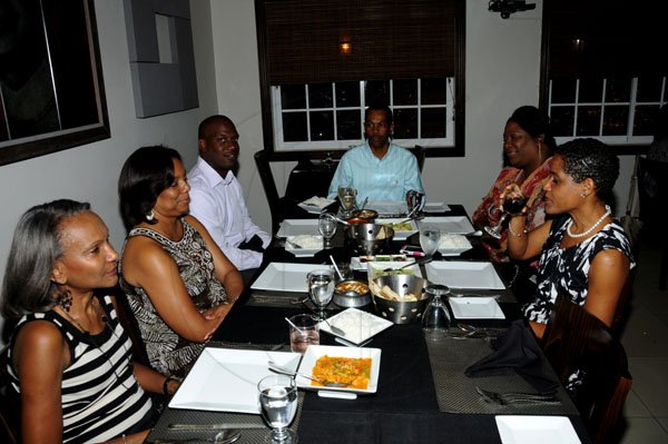 Winston Sill / Freelance Photographer
Restaurant Week feature; Colin Bourne and guests dine at Tamarind Indian Restaurant, Orchid Village, Barbican on Tuesday night November 8, 2011. Here from left are Janet Delisser; Lois Bourne; Ramon Pitter; Colin Bourne; Sonia Davidson; and Janelle Brown.