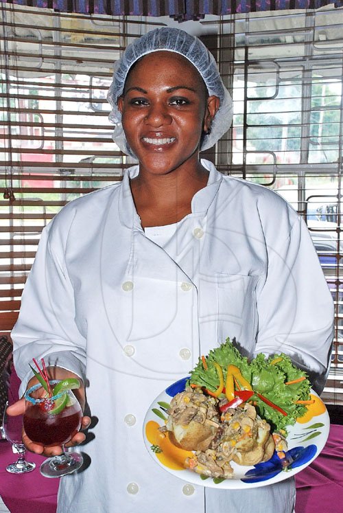Colin Hamilton/Freelance Photographer
Head chef at Starapples Latoya Masters with Beef Stroganoff  that will be on this year's Restaurant Week menu.


 
Restaurant Week Photoshoot at Starapples on Friday September 30, 2011.