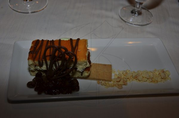 Janet Silvera Photo

A sinfully tasty Jamaican rum cream cheesecake with rosemary ad white chocolate mouse on the side.