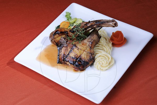 Gladstone Taylor / Photographer

STAR DISH 
Grilled marinated pork chops with guava pineapple sauce. This new menu item is served with mashed potatoes and steam vegetables. 

*********

Mango Tree Restaurant

Restaurant week