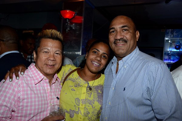Winston Sill/Freelance Photographer
Brian "Ribbie" Chung Birthday Party, held at Ribbiz Ultra Lounge, Acropolis Gaming Loung, Loshusan Shopping Centre, Barbican on Thursday night April 24, 2014. Here are Ribbie Chung (left); Kimika Peterkin (centre); and Marshall Peterkin (right).