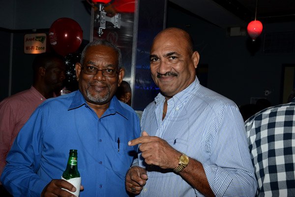 Winston Sill/Freelance Photographer
Brian "Ribbie" Chung Birthday Party, held at Ribbiz Ultra Lounge, Acropolis Gaming Loung, Loshusan Shopping Centre, Barbican on Thursday night April 24, 2014. Here are John Edwards (left0; and Marshall Peterkin (right).