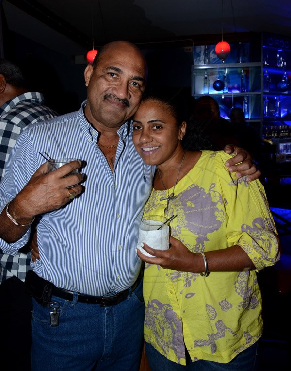 Winston Sill/Freelance Photographer
Brian "Ribbie" Chung Birthday Party, held at Ribbiz Ultra Lounge, Acropolis Gaming Loung, Loshusan Shopping Centre, Barbican on Thursday night April 24, 2014. Here are Marshall Peterkin and daughter Kimika.