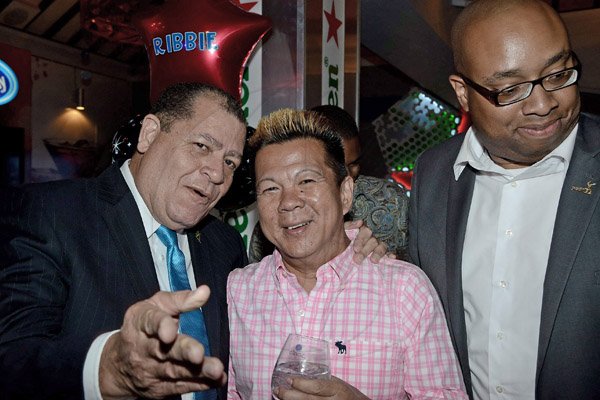Winston Sill/Freelance Photographer
Brian "Ribbie" Chung Birthday Party, held at Ribbiz Ultra Lounge, Acropolis Gaming Loung, Loshusan Shopping Centre, Barbican on Thursday night April 24, 2014. Here are Audley Shaw (left); Ribbie Chung (centre); and Delano Seiveright (right).