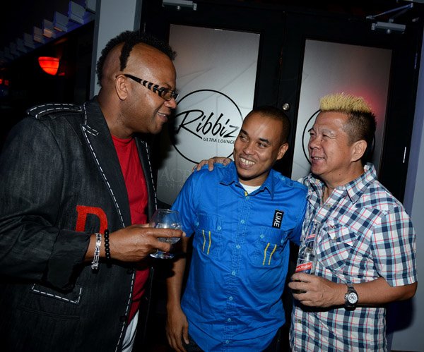 Winston Sill/Freelance Photographer
Ribbiz Ultra Lounge host the Grand Unveiling of World Cup Viewing Party, held at Batbican Centre, East King's House Road on Wednesday night June 11, 2014. Here are Don Creary (left); LIME's Carlo Redwood (centre); and Brian Chung (right).