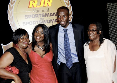 Winston Sill / Freelance Photographer
RJR National Sportsman and Sportswoman of the Year Awards Ceremony, held at the Jamaica Pegasus Hotel, New Kingston on Friday night January 20, 2012. Here are Pat Luton (left); Tessa Sanderson (second left); Usain Bolt (second right); and Murphy Sanderson (right.