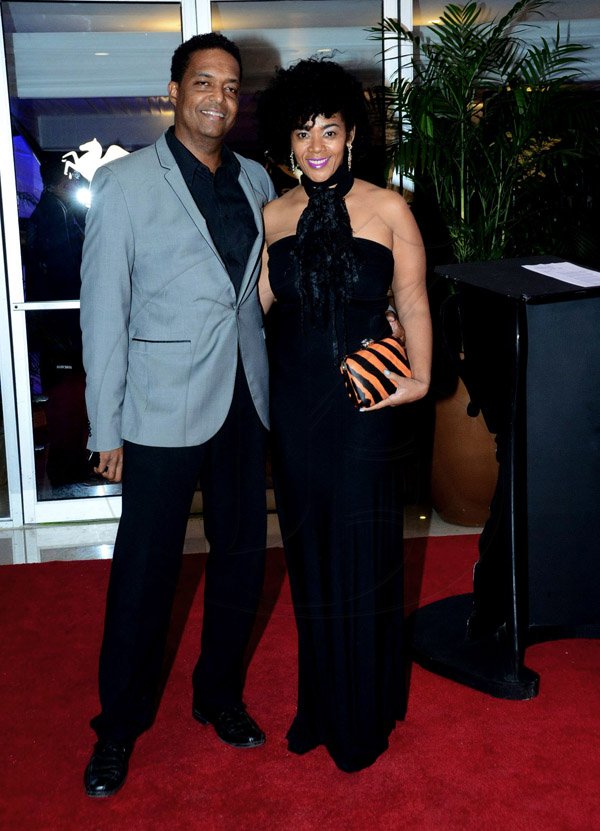 Winston Sill/Freelance Photographer
The RJR National Sportsman and Sportswoman of the Year 2014 Awards Ceremony, held at the Jamaica Pegasus Hotel, New Kingston on Friday night January 16, 2015.  Here are Quintin? Aris and his wife Lisa Aris.