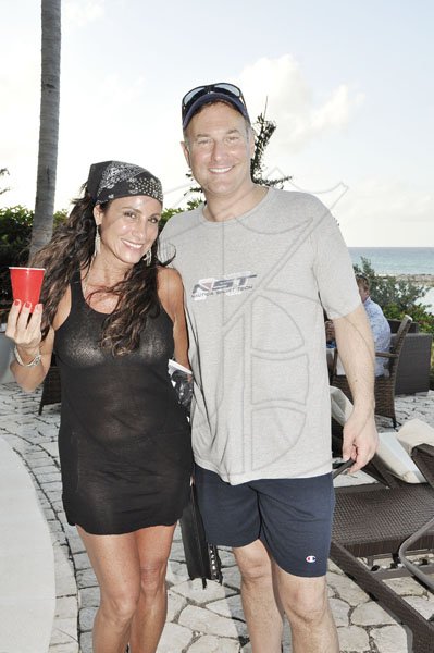 Janet Silvera Photo
Jill Rizen of Philadelphia and businessman, Ron McKay at his poolside party with his 'breddas' at the Palmyra Resort and Spa in Montego Bay last Saturday afternoon