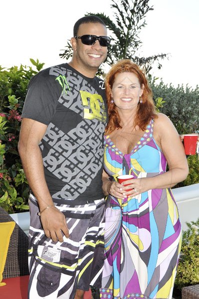 Janet Silvera Photo
 
Scott Jones and Christine Stambough at ADS Global's Ron McKay's poolside party with his 'breddas' at the Palmyra Resort and Spa in Montego Bay last Saturday afternoon